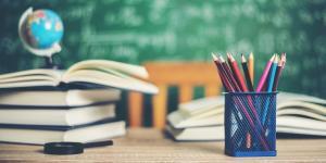 Pencil holder and books on the table