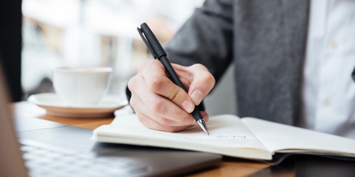 Businessman writing