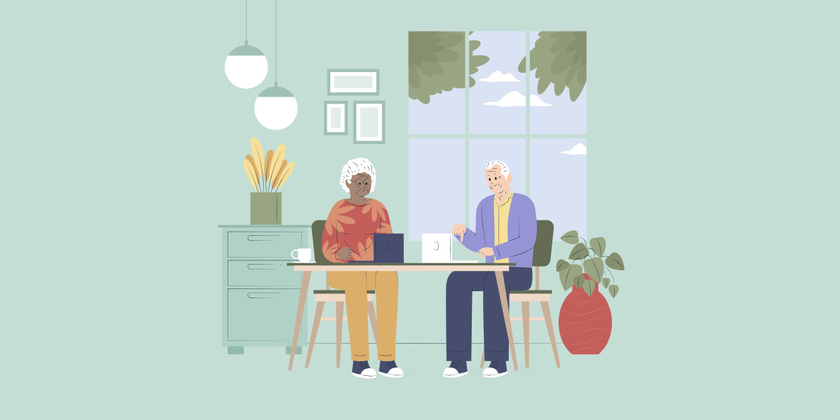 Retired man and retired woman sitting at the table