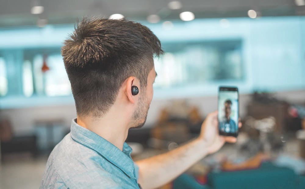 Man making a video call on a mobile phone